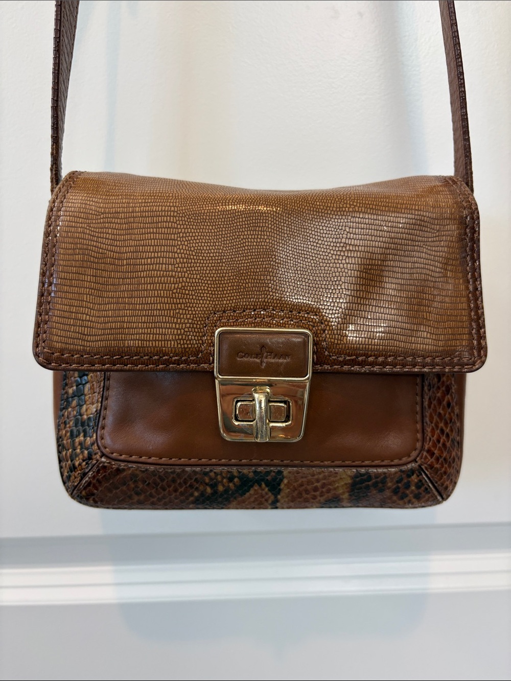 Cole Haan Brown leather & Snake embossed Print adjustable strap. Gold hardware